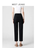 Jeans a sigaretta neri a vita alta