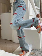 Jeans a vita alta ricamati