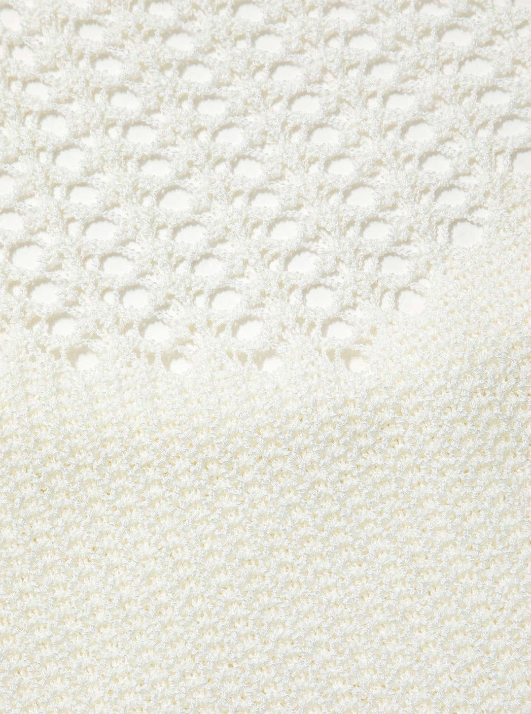 Mini abito in maglia senza schienale con vita all'uncinetto e allacciatura alla caviglia